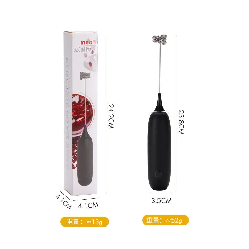 A hand-held electric milk frother in black and white colour options on a kitchen counter.