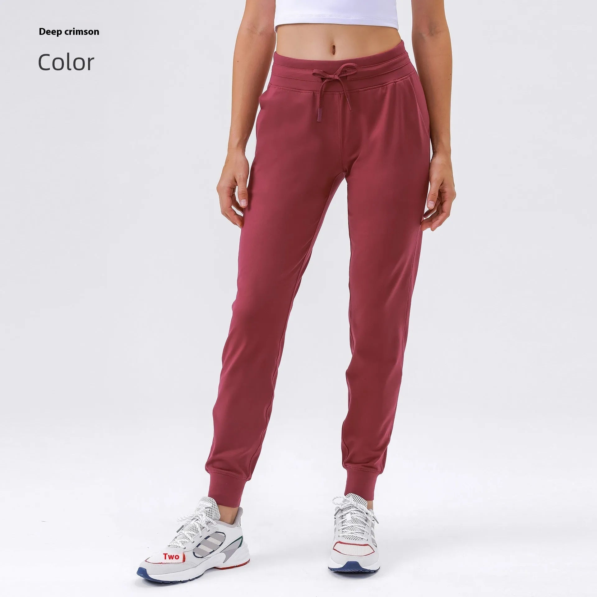 Women's high-waist yoga pants with drawstring waistband in distilled coffee colour, suitable for fitness.
