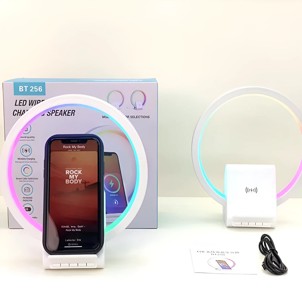 White smart Bluetooth speaker with wireless charging pad and ambient lighting measuring 225mm wide