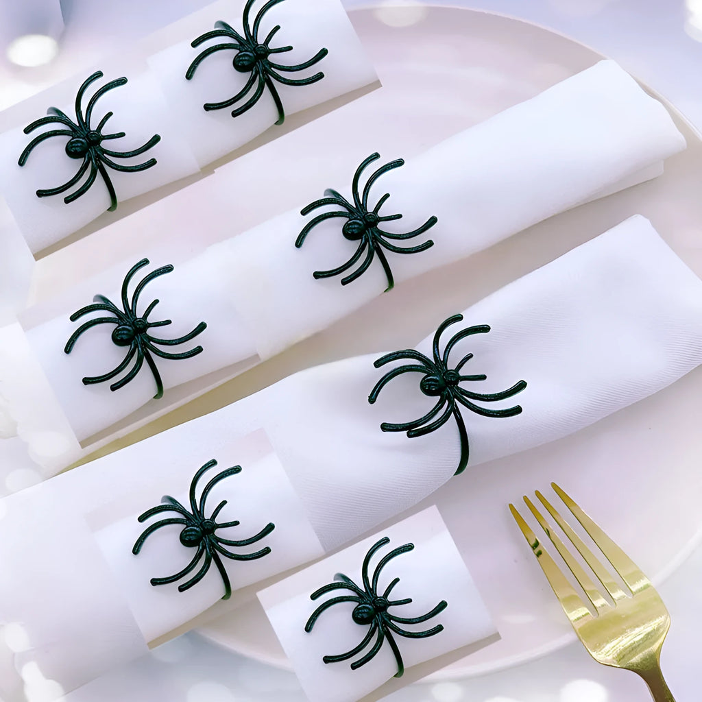 Set of six black spider Halloween napkin rings made from alloy material