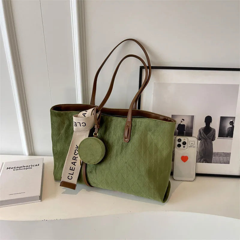 Large polyester shoulder tote bag in horizontal square shape with zipped compartment and sandwich pocket