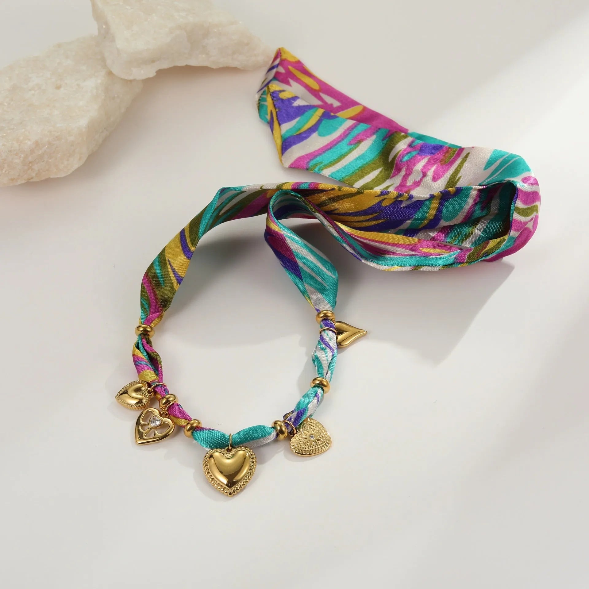 Women's stainless steel necklace and bracelet set with 18K gold plating and geometric pendant