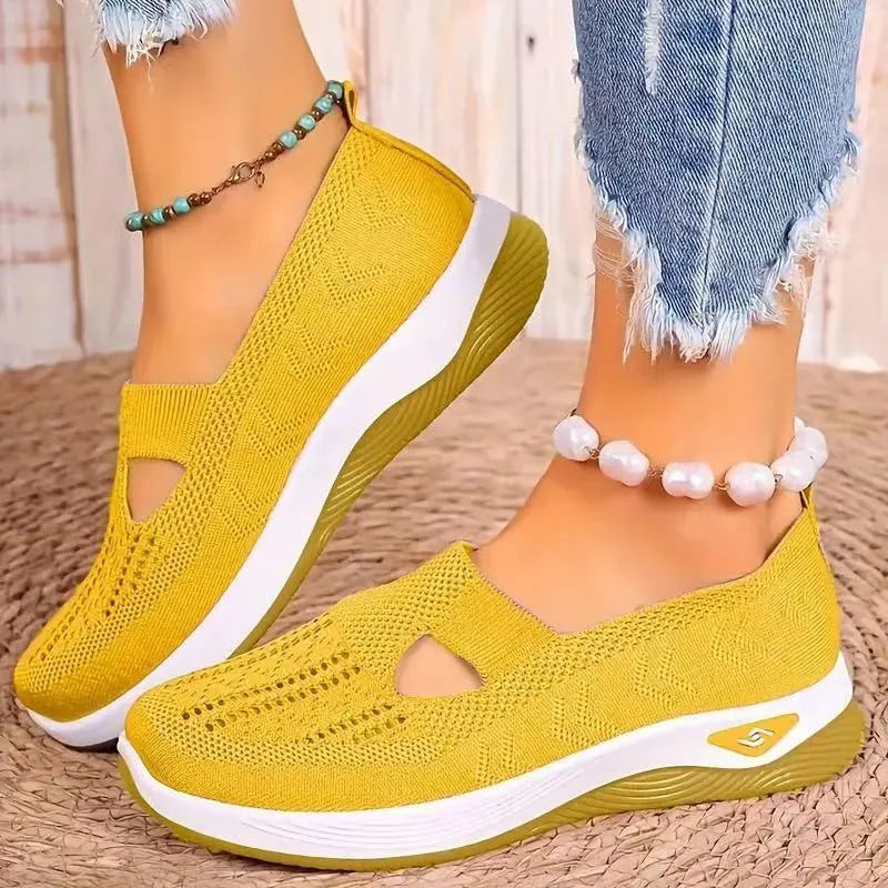 Women's casual mesh flat shoes with a T-bar strap and round toe in multiple colours.