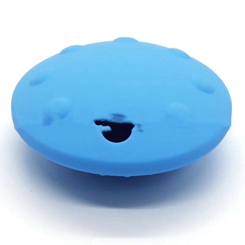 Pet drop-resistant silicone slow feeder frisbee in black, 120mm size, on white background