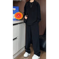Men's black slim fit hemp polo shirt and trousers two-piece casual suit set on hanger