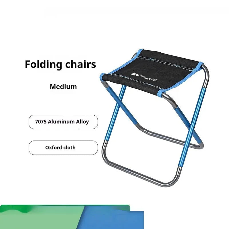Black aluminium alloy folding camping stool shown open for use and folded flat for storage.