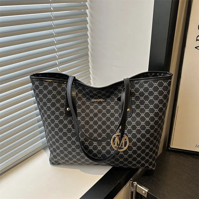 Street trend shoulder bag made from PU material with sewing thread decorative elements