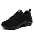 Women's red and black mesh sneakers with lace-up front and round toe design