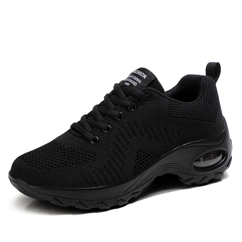 Women's red and black mesh sneakers with lace-up front and round toe design