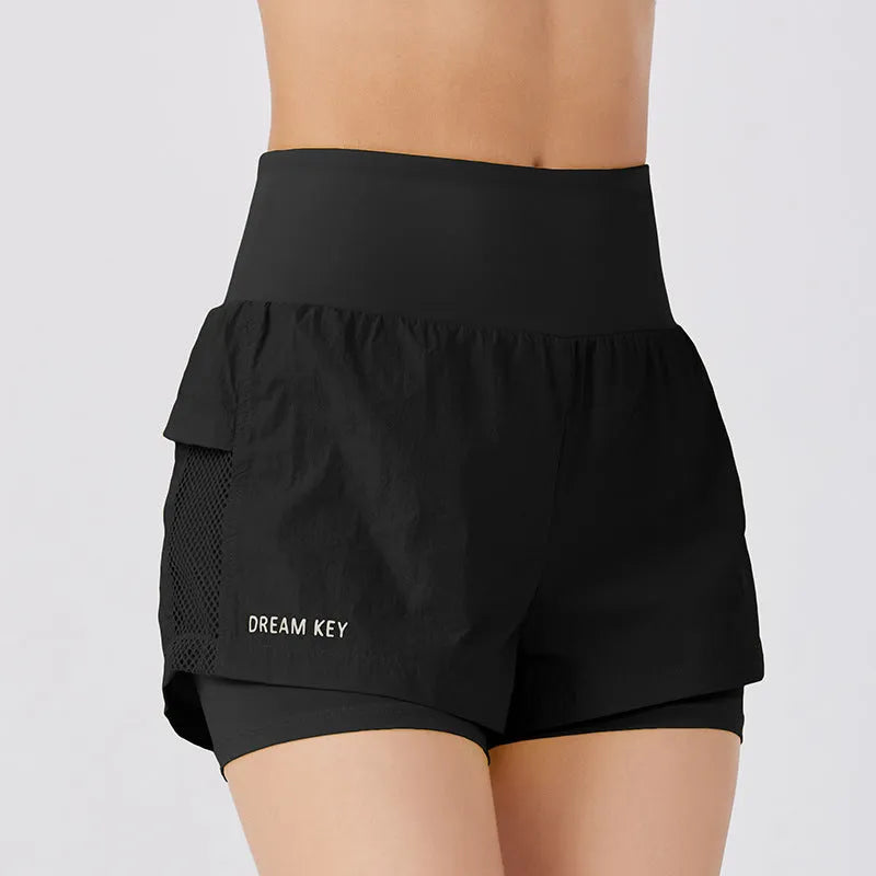 Women's loose casual cotton blend quick-drying sports shorts in multiple colours on a hanger.