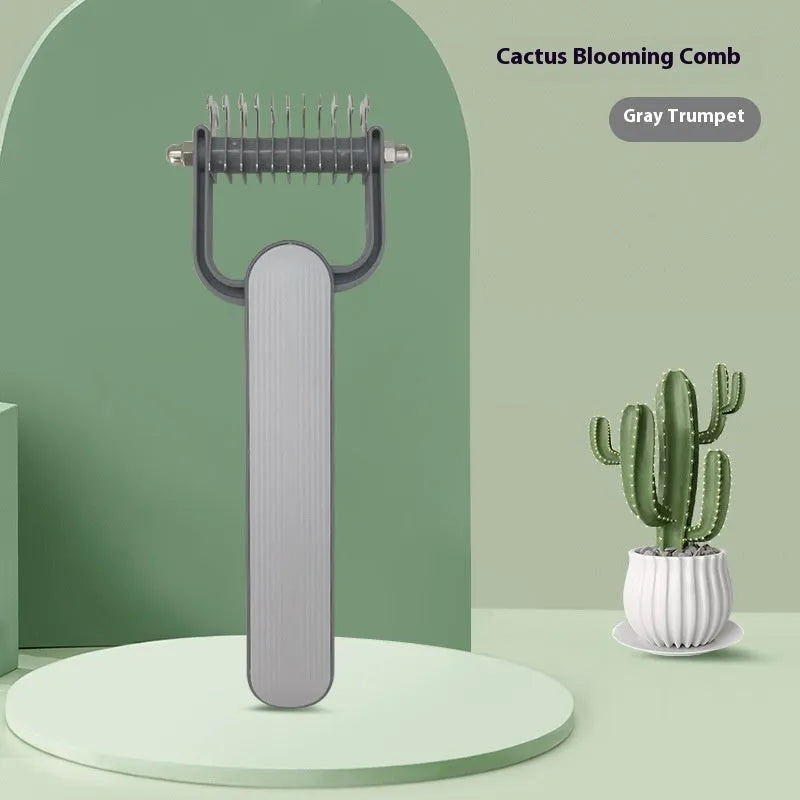 Green and grey dog grooming comb with plastic handle and stainless steel teeth for unknotting