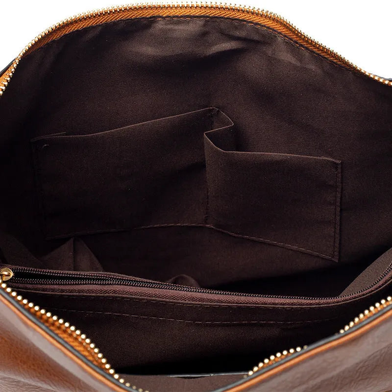 Large capacity PU hobo bag for women with zip closure, internal pockets, and soft handles in solid colour