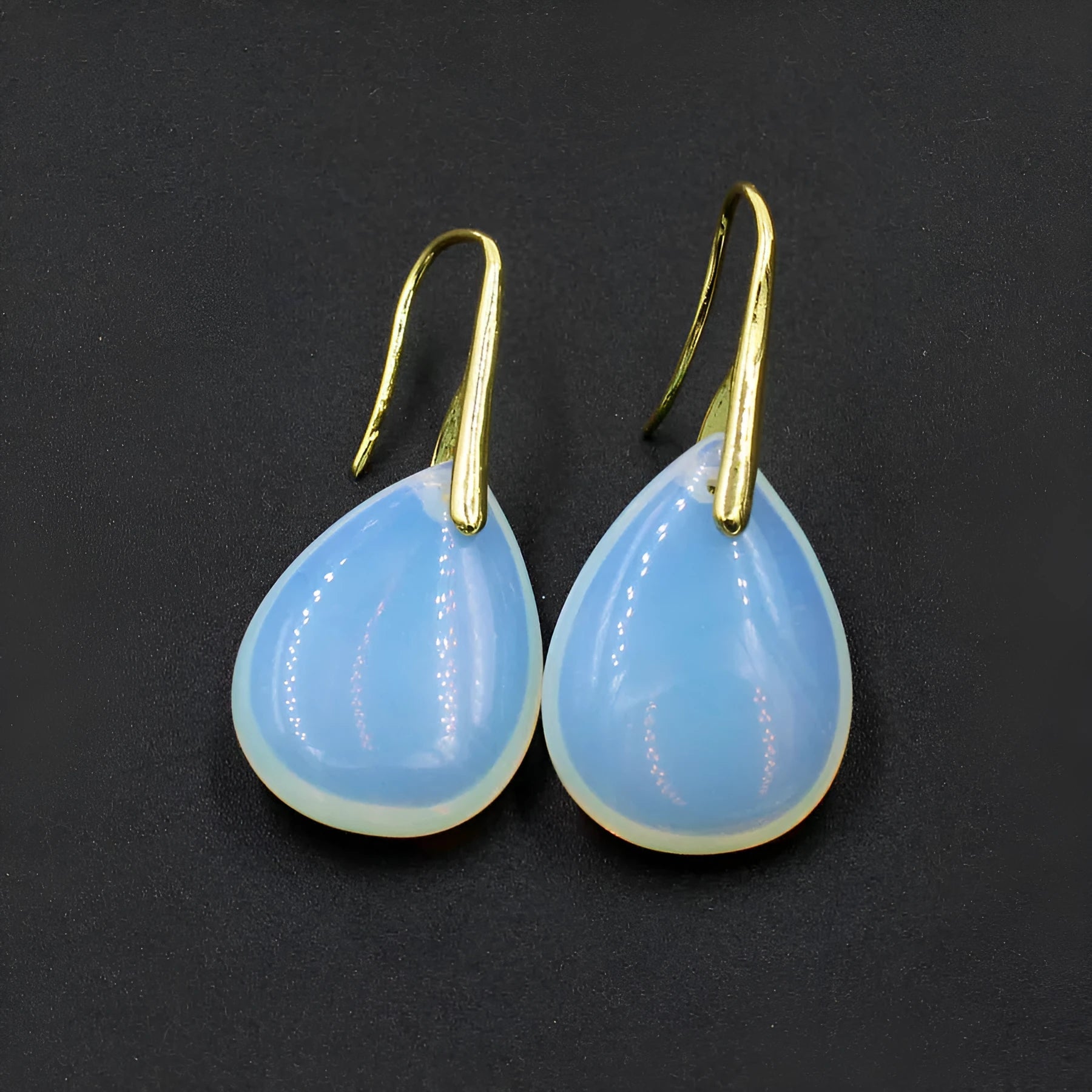 Geometric water drop earrings with crystal gemstones in various colour options on electroplated metal settings