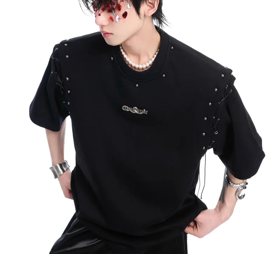 Women's black deconstruction lace-up cutout short sleeve t-shirt on a hanger.