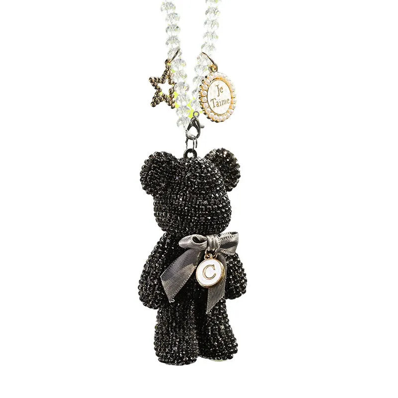 Violent Bear character car rearview mirror pendant with rhinestones in black, white, and pastel colours.