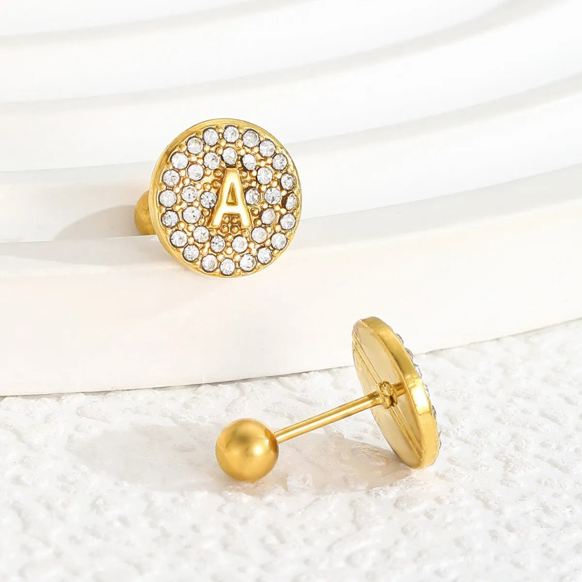 Round micro inlaid zircon stainless steel stud earring with real gold plating, English letter A on a unisex college style earring
