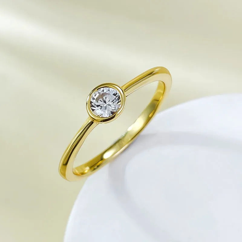 Minimalist silver crown-shaped ring with linear engraving detail in gold or platinum finish