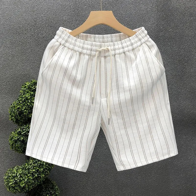 Men's black and white striped fleece-lined casual shorts showing double-layer waistband and straight-leg cut