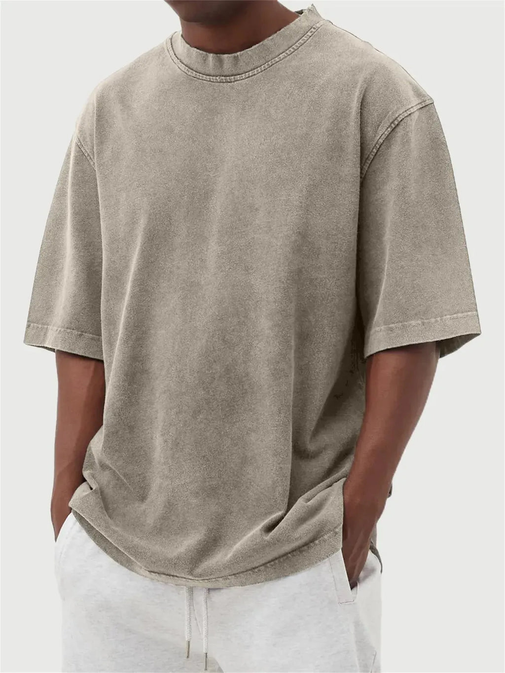 Men's loose fit distressed stone wash pullover t-shirt in solid colours like army green and blue.