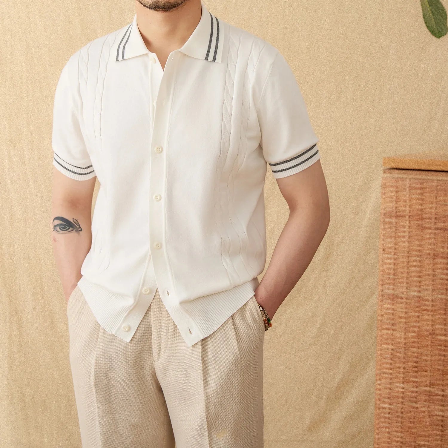 Men's apricot lapel polo shirt with short sleeves made from cotton polyester blend fabric.
