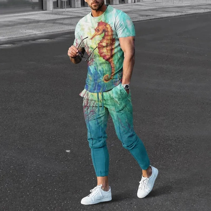 Man wearing a short-sleeved printed round neck pullover and matching trousers from a lightweight athletic suit set.