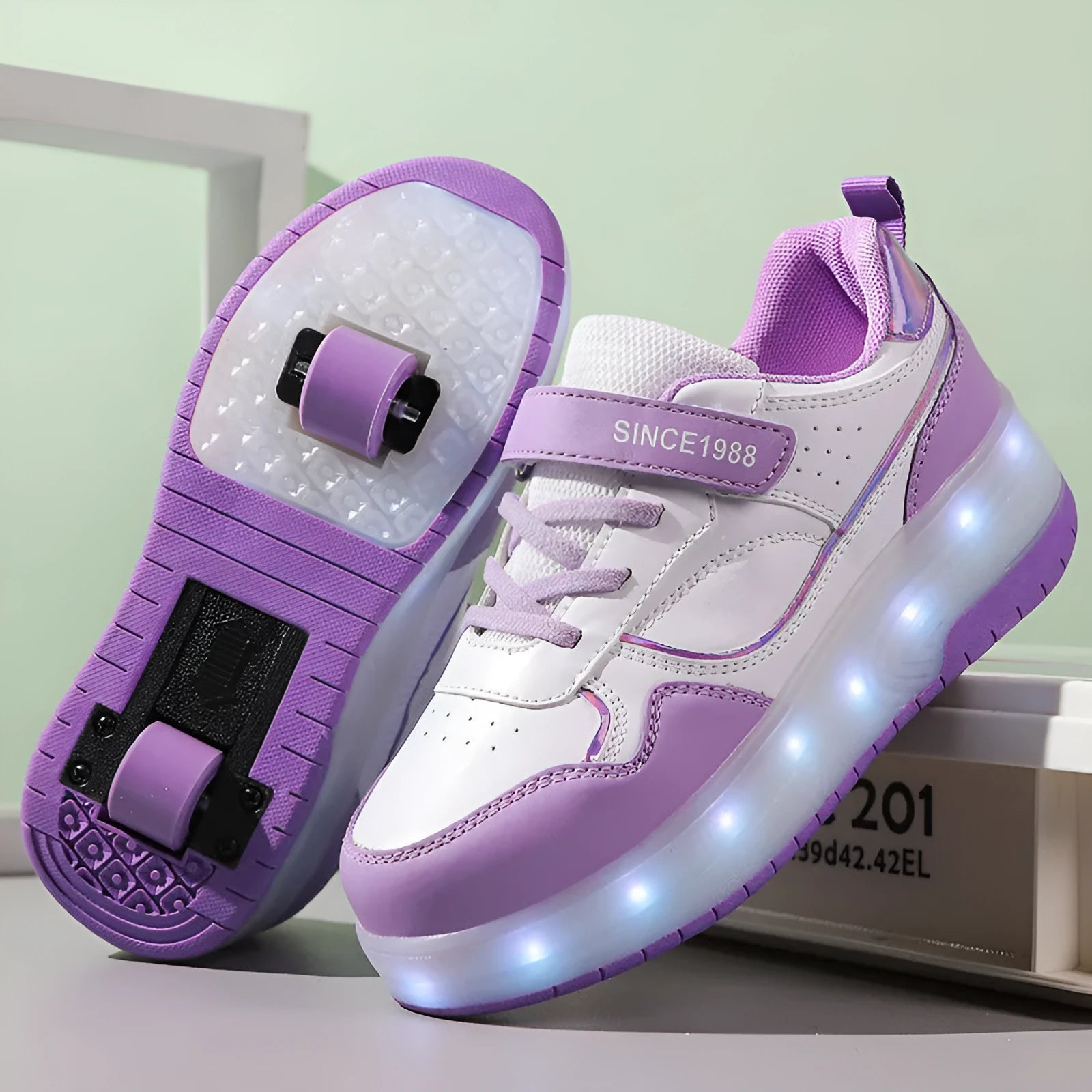 Charging flash roller skates with LED light-up wheels in black, pink, purple and white colour options