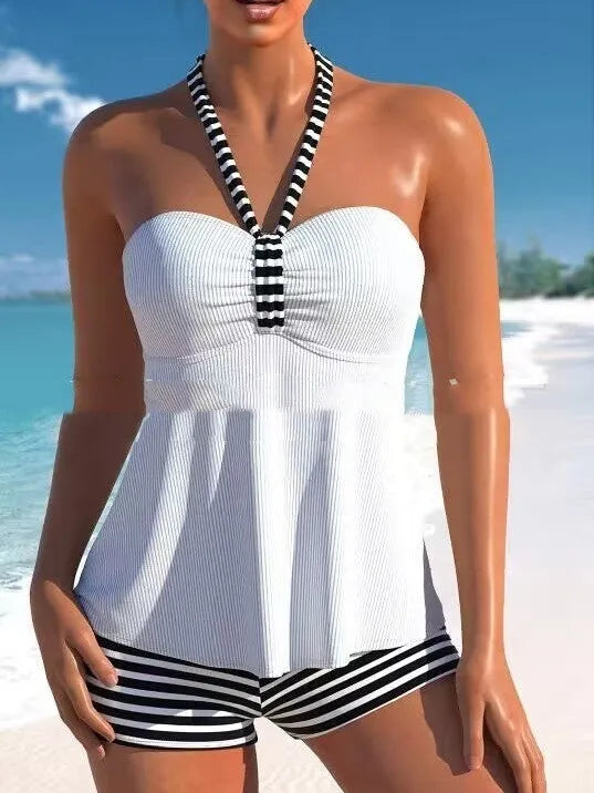 Women's off-shoulder swimsuit in black and white stripes and solid colours