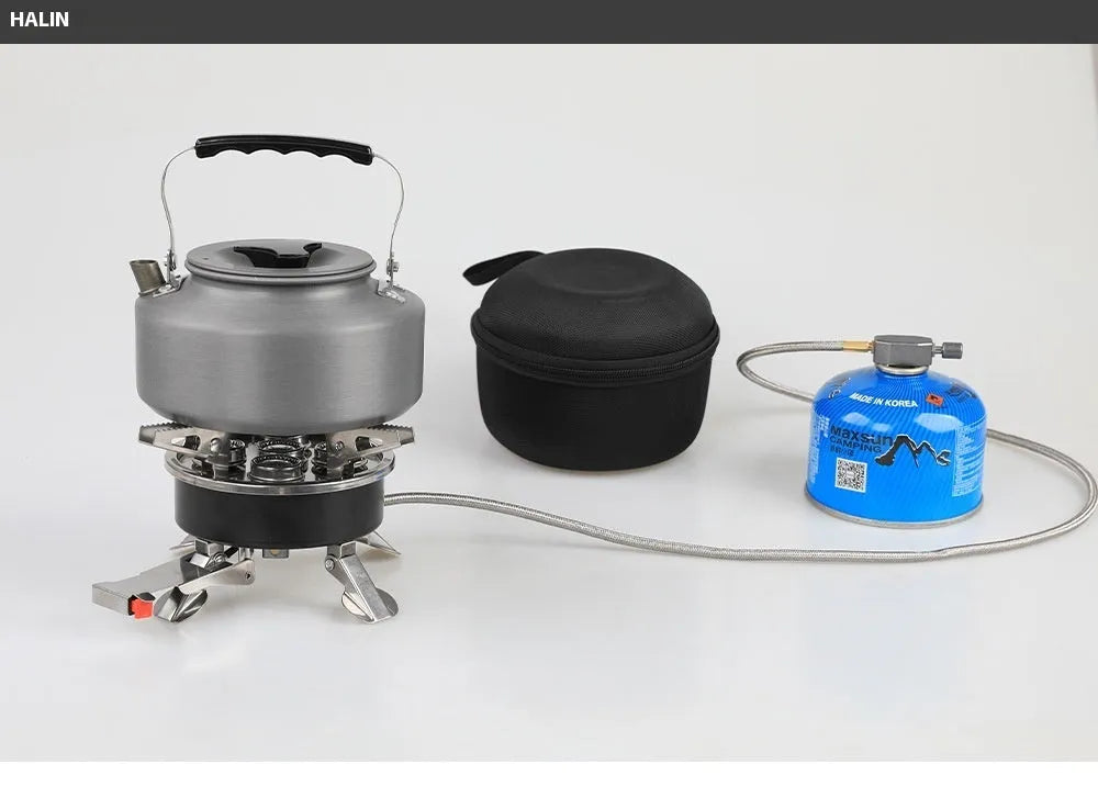 Silver coloured portable split stove made of stainless steel and copper with a long hose, shown folded for transport.