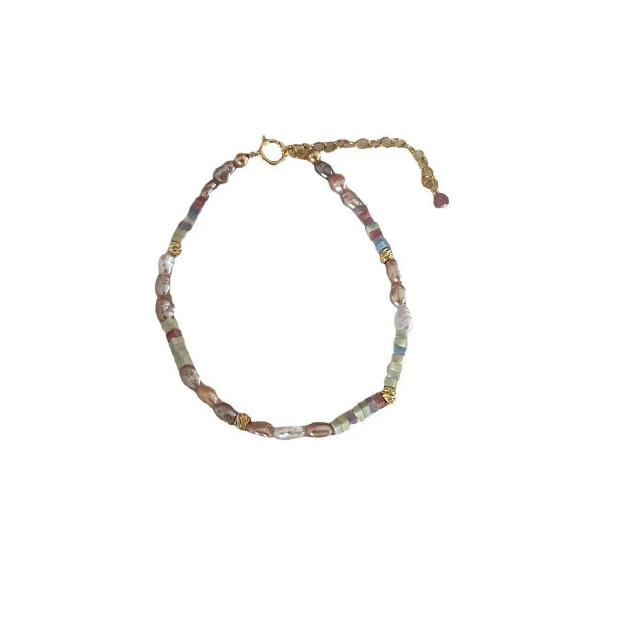 Women's natural pearl bracelet and necklace set in purple and silver colours