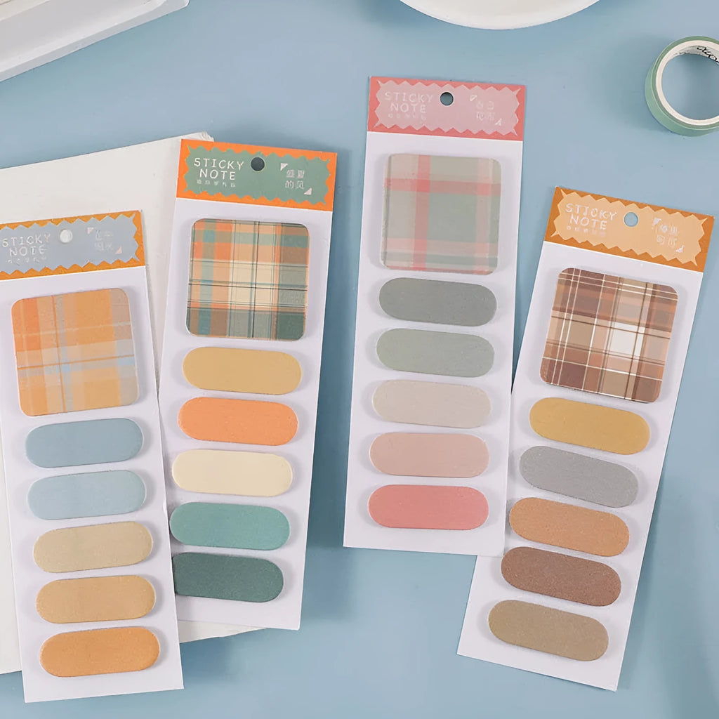Colourful memo pad with plaid design sticky notes showing six different patterns