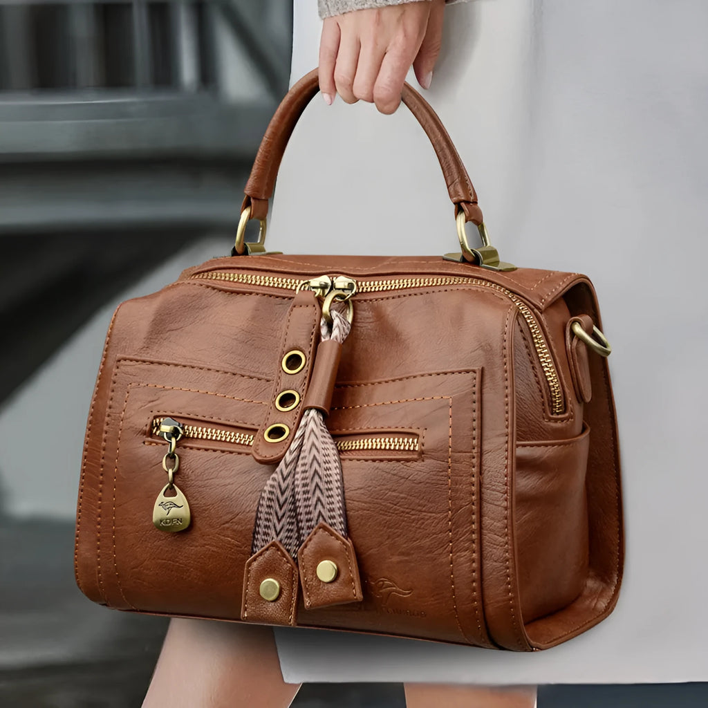 Soft grey PU women's crossbody bag with a square shape and an external sandwich pocket.