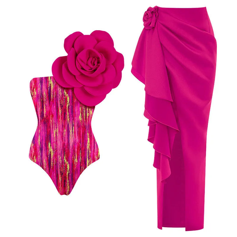 Women's one-piece swimsuit with three-dimensional floral pattern in black and blue colour options.