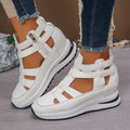 Women's black platform sandals with hollow-out design and Velcro fastening