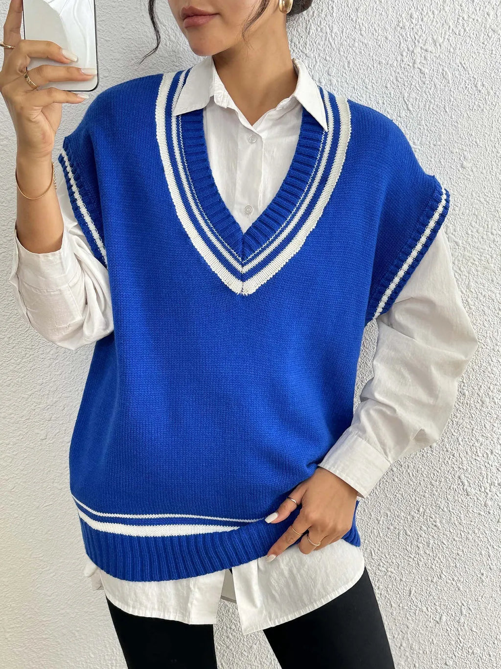 Women's college style casual vest sweater in loose fit with acrylic polyester blend fabric