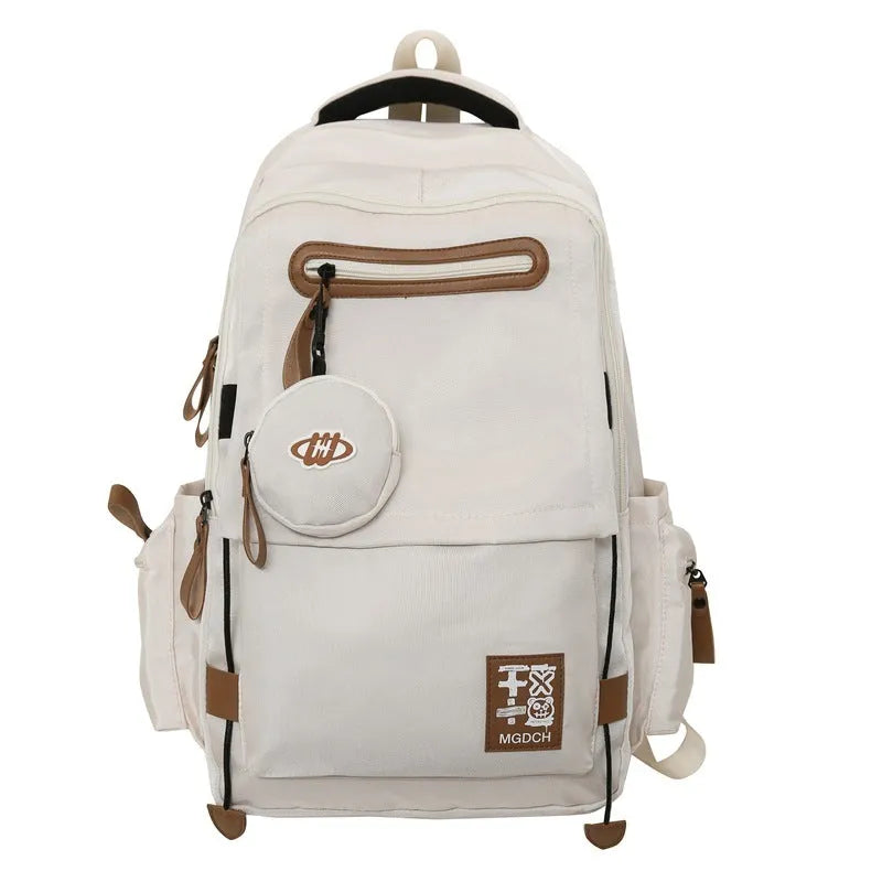 Large-capacity nylon school backpack for middle school students in solid colour with curved shoulder straps