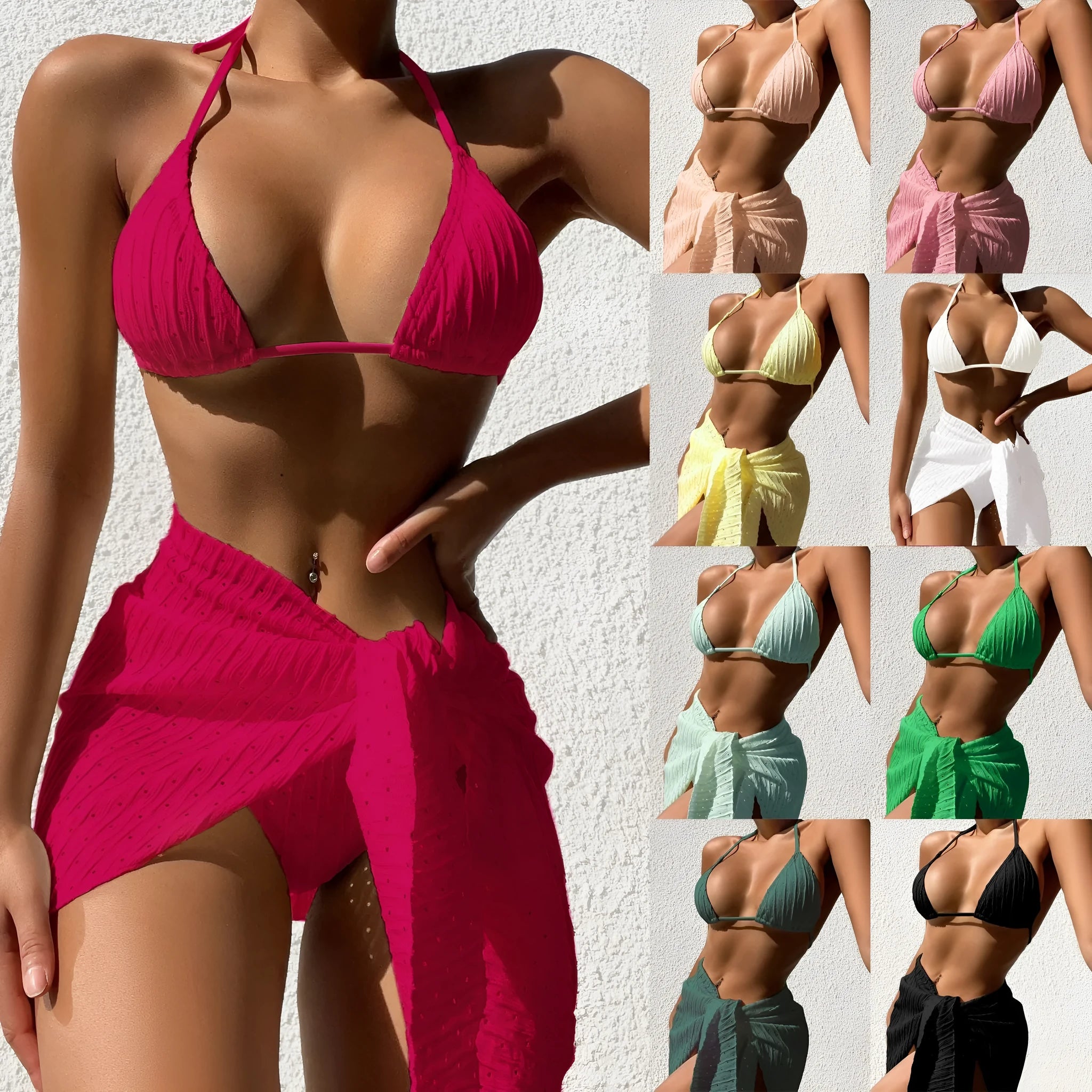 Women's 3-piece halterneck swimsuit set in a solid colour with a mesh skirt.