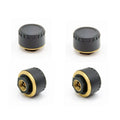 Four black Bluetooth tyre pressure monitors for car with mobile phone display showing pressure readings