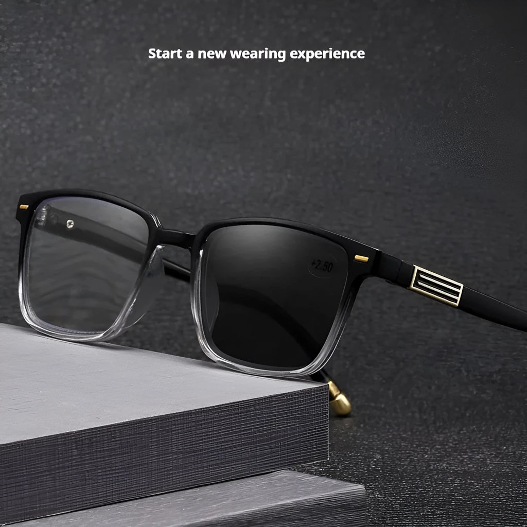Anti blue light multifocal reading glasses with colour changing lenses in a black and gold frame style.