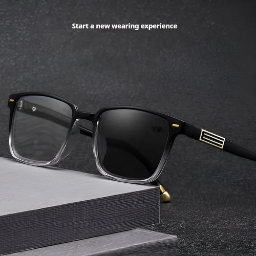 Anti blue light multifocal reading glasses with colour changing lenses in a black and gold frame style.
