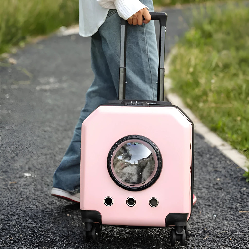 Hard PVC pet flight case on wheels in orange colour with removable luggage compartment.