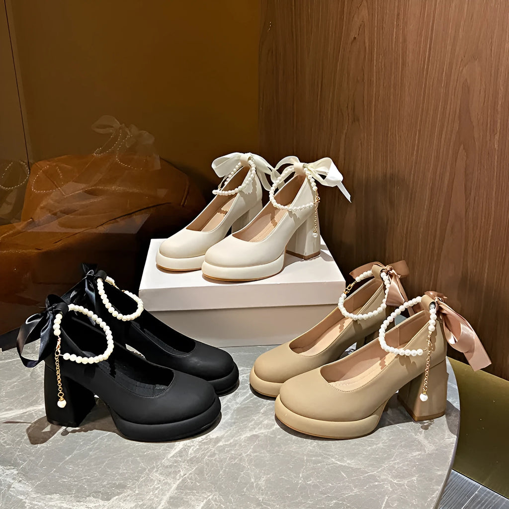 Women's beige Mary Jane shoes with chunky heel and ankle-strap buckle on a white background