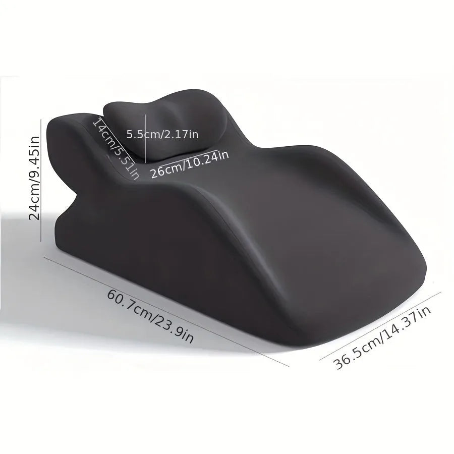 Ergonomic stomach sleeper pillow for reading in bed, shown in blue colour
