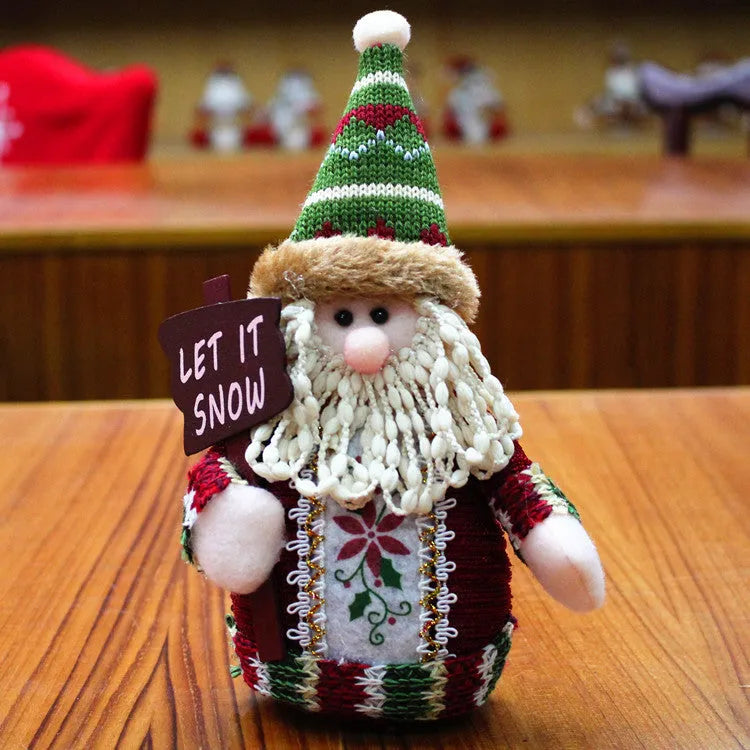 Red flannel Christmas snowman decoration measuring 18 by 13 centimetres