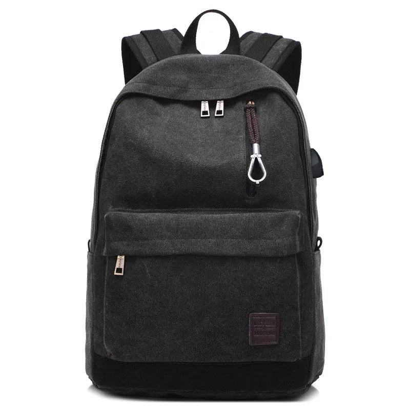 Canvas USB rechargeable backpack in grey showing front pocket and shoulder strap