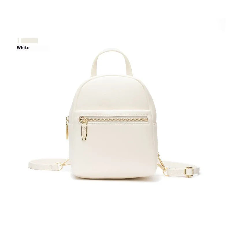 Soft PU mini backpack in multiple colours showing outer pocket and street style design