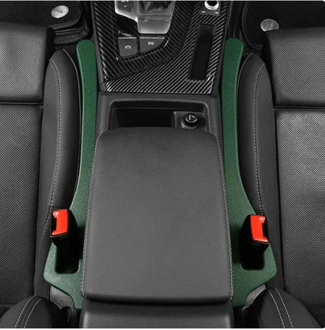 Flexible polyurethane car seat gap filler strip in beige colour on a car seat.