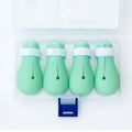 Set of four green silicone cat scratch protection gloves or foot covers.