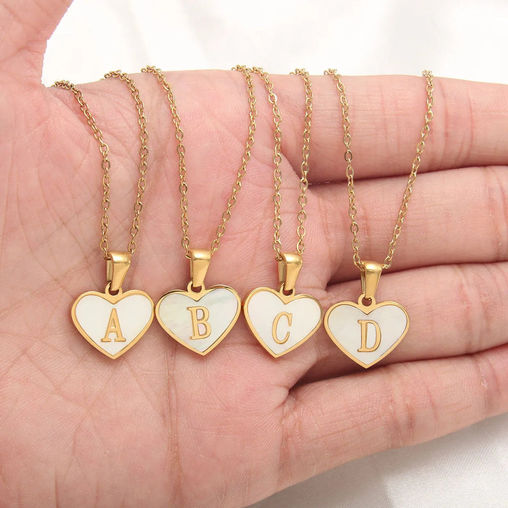 Gold plated personalised heart necklace with white shell on a 45cm chain