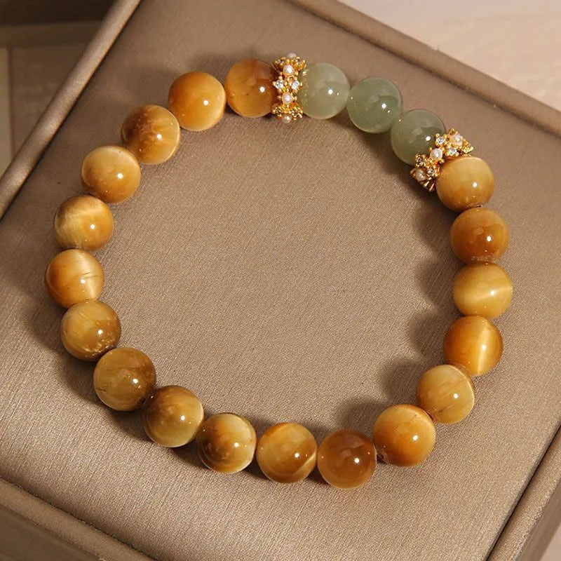Natural yellow Tiger's Eye bracelet with Chinese auspicious patterns in U-shaped design