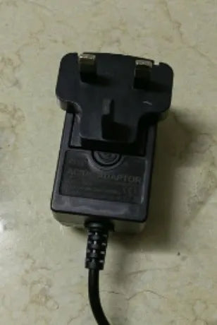 Charging hair clipper set with European, American and British plug adapters